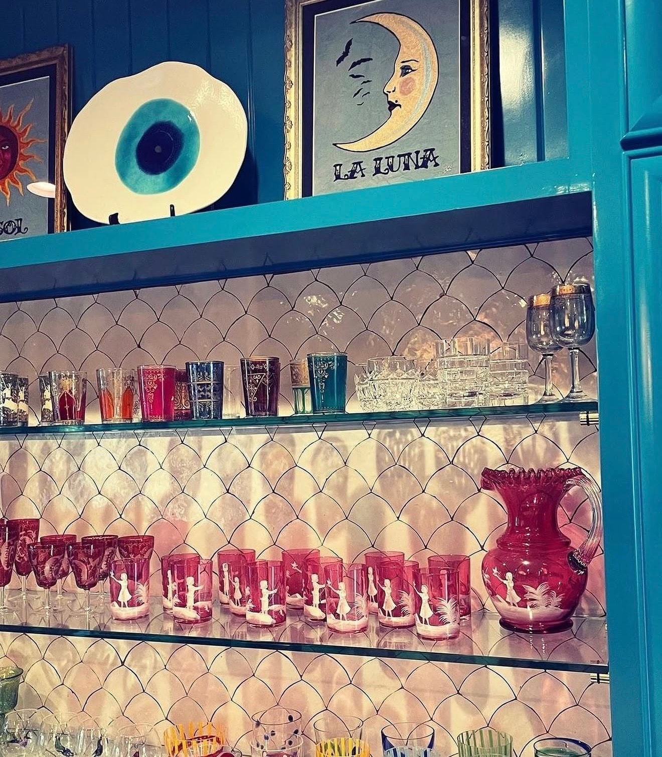 Curated glassware and artwork display