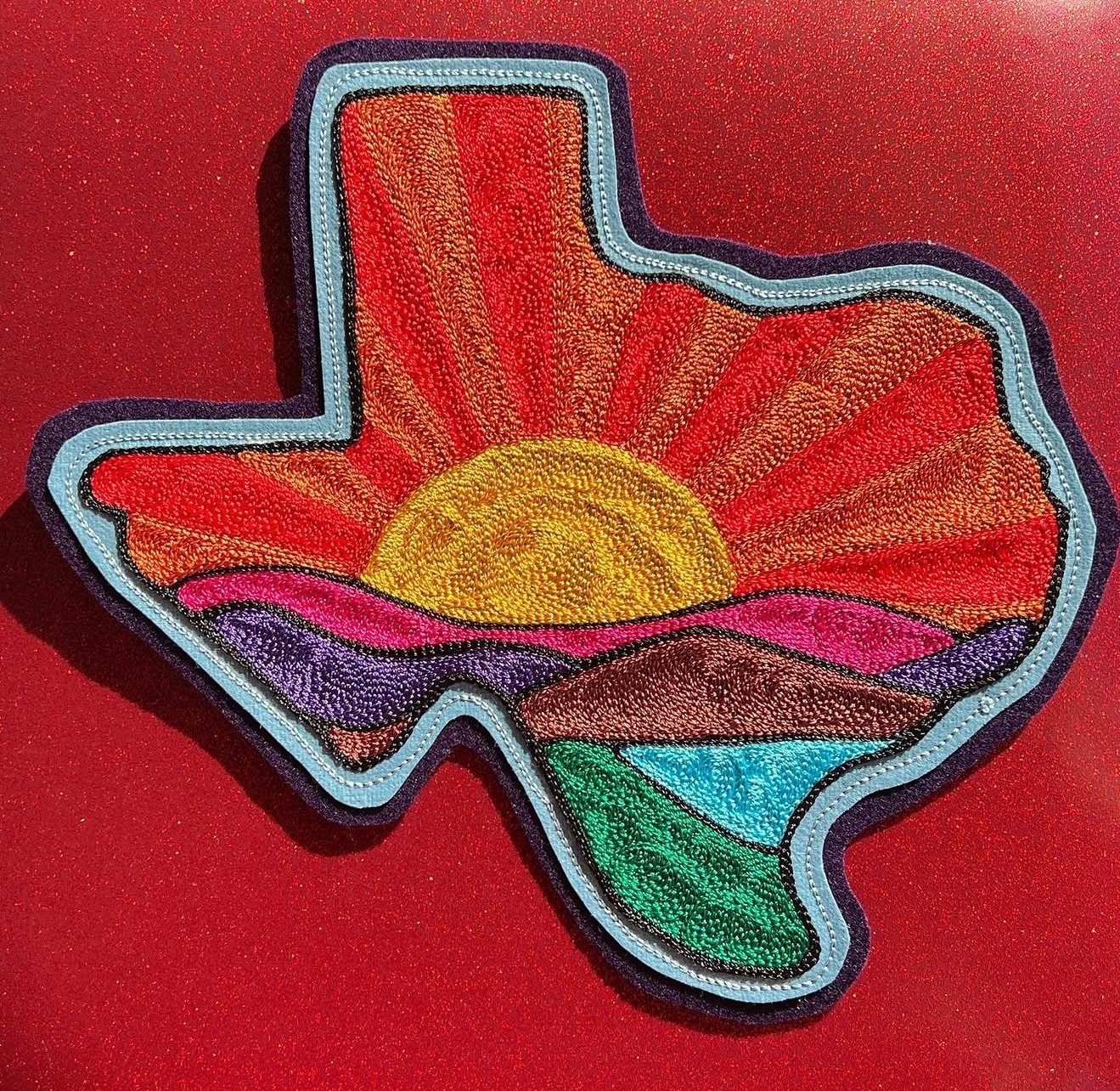 Embroidered denim jacket back art